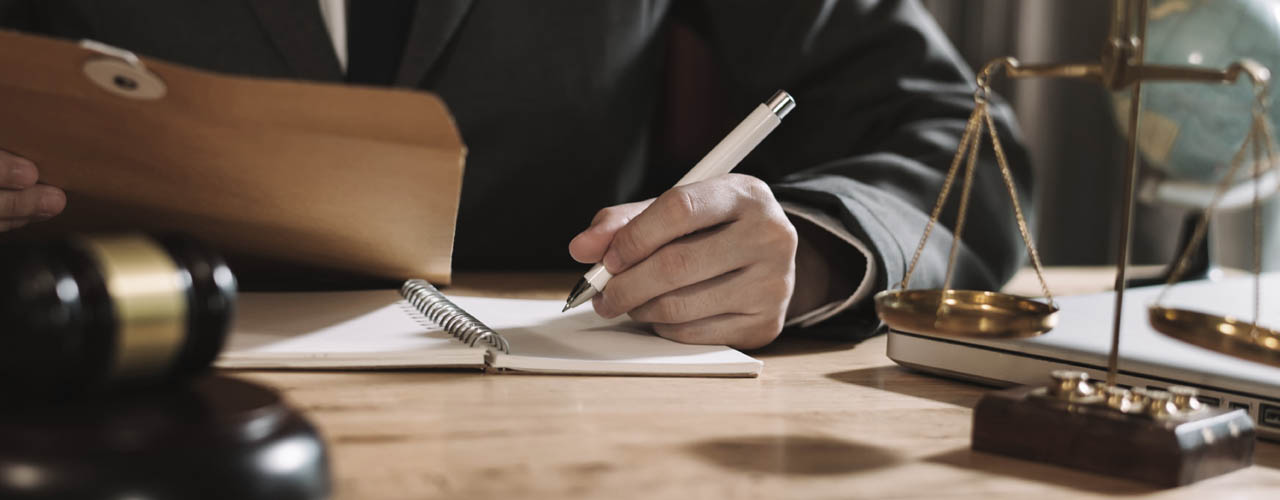 justice and law concept.Male judge in a courtroom on wooden tabl