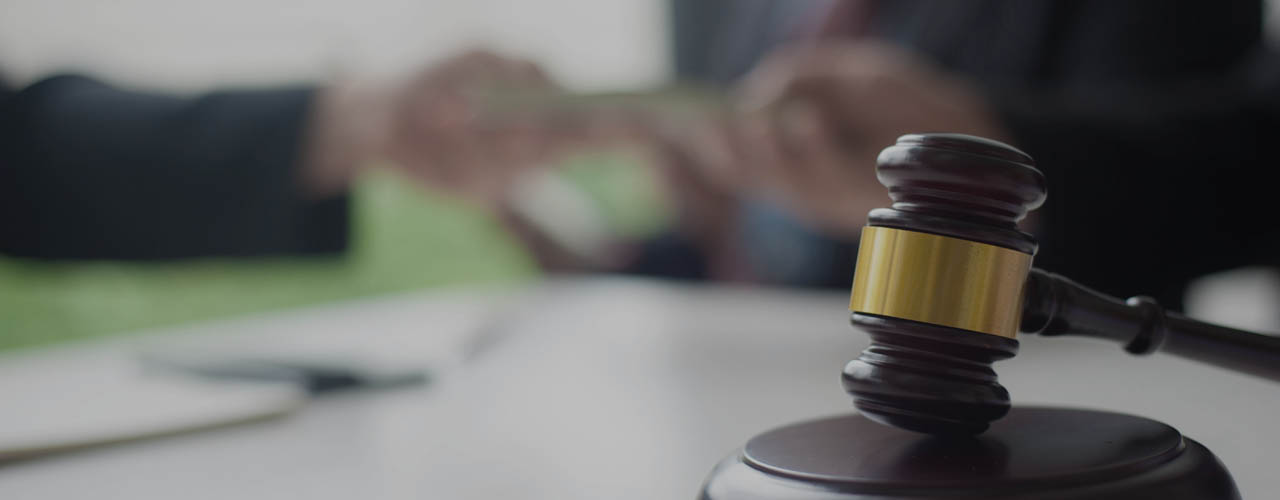 The concept of bribery of lawyers and judges.