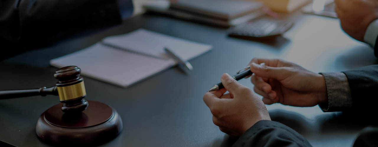 Businessman and lawyer discuss the contract document. Treaty of