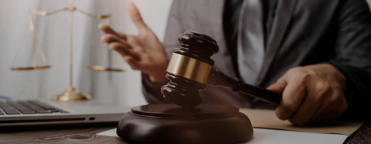 Justice and law concept.Male judge in a courtroom with the gavel