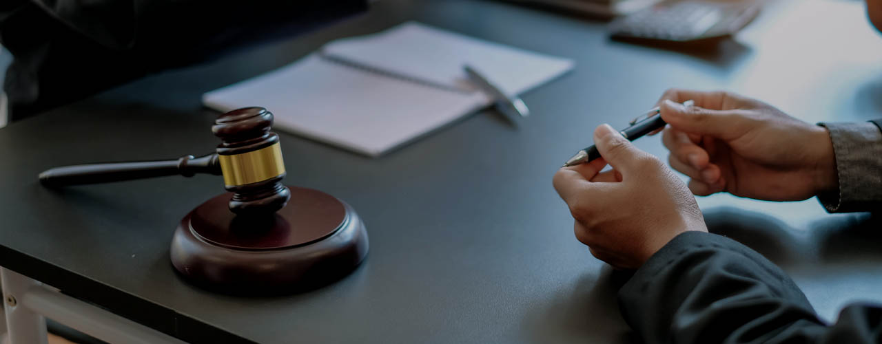 Businessman and lawyer discuss the contract document. Treaty of