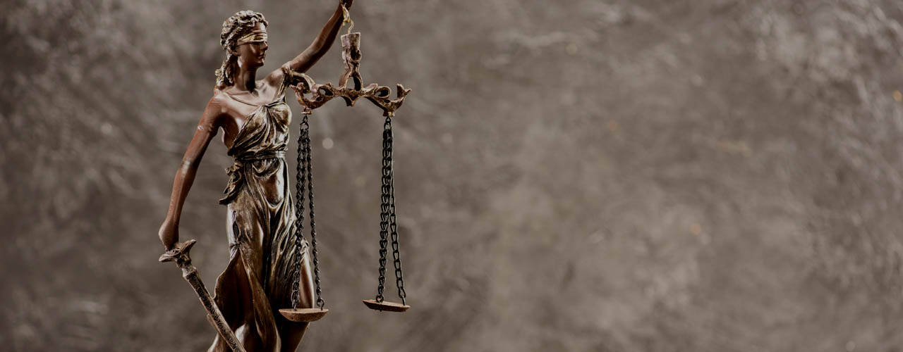 Close-up view of antique statue of lady justice, Law concept