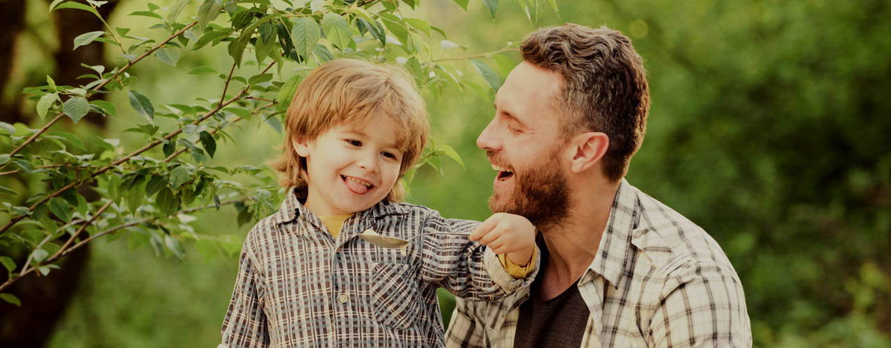 Feed Your Baby. Natural Nutrition Concept. Dad And Cute Toddler